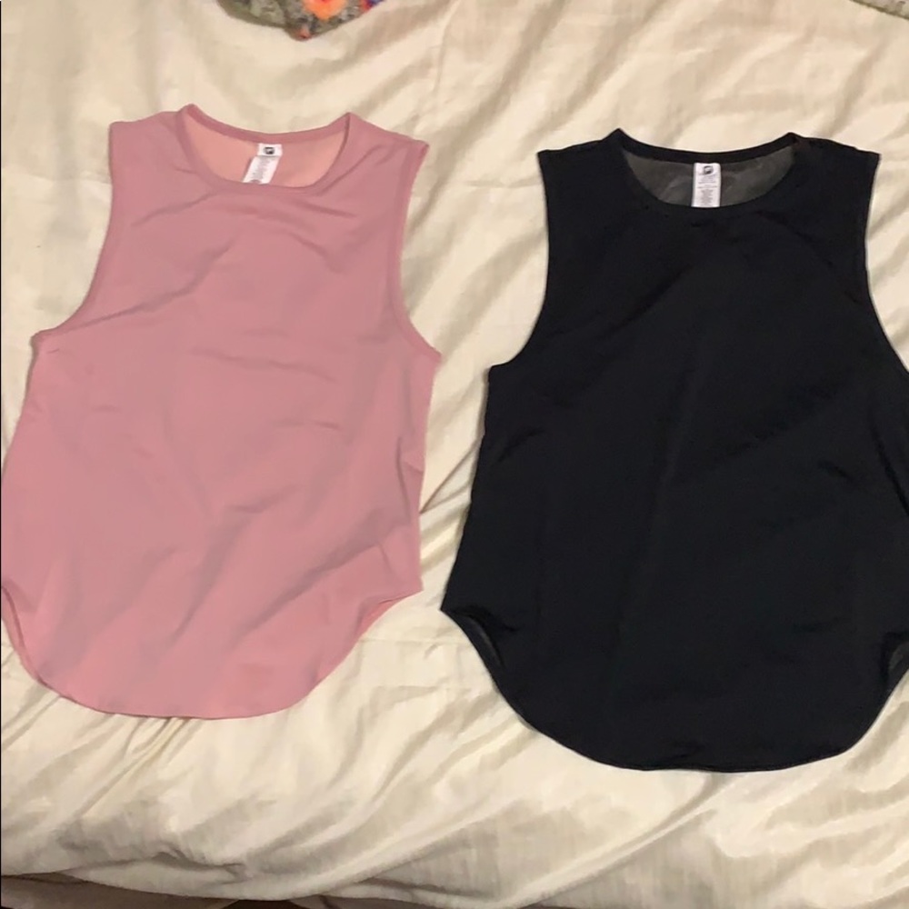 Two work out tanks